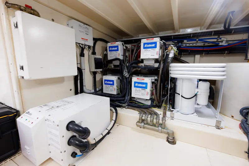 Slide: The Image of Engine room of 2010 Vicem 64 yacht with Cruisair systems and electrical components. - 98