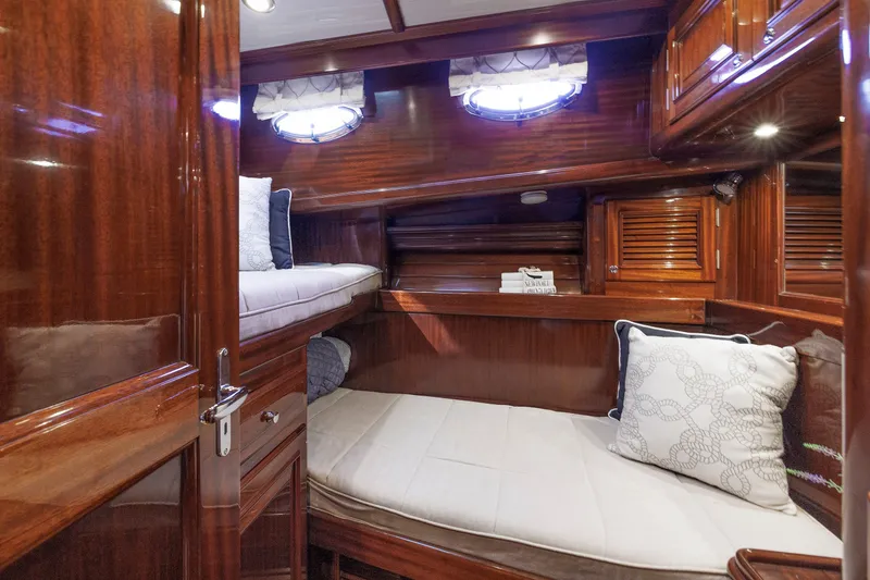 Slide: The Image of Luxurious cabin interior of 2010 Vicem 64 yacht with polished wood and cozy bedding. - 88