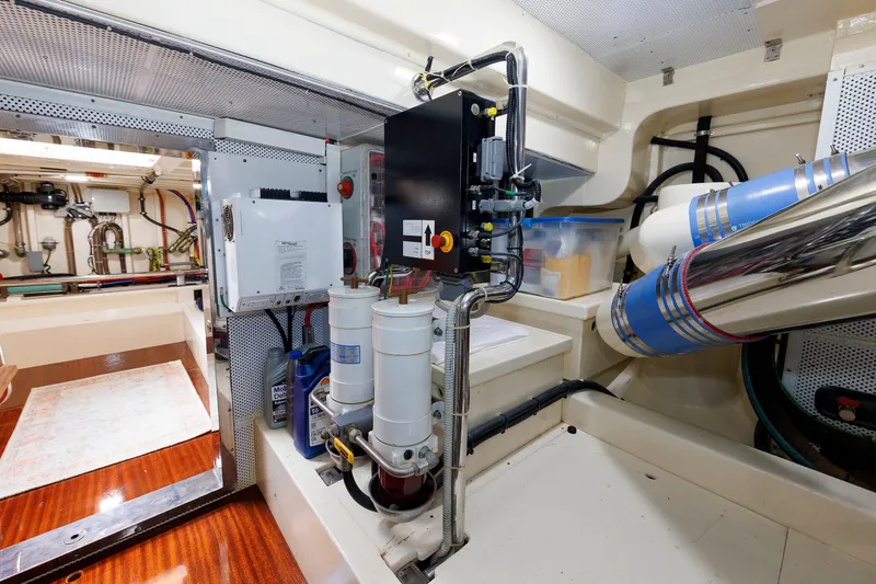 Slide: The Image of Engine room of 2010 Vicem 64 yacht, showcasing mechanical components and systems. - 97