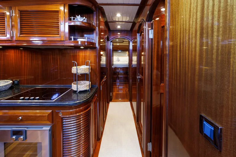 Slide: The Image of Luxurious interior of 2010 Vicem 64 yacht featuring elegant wood finishes and modern amenities. - 75