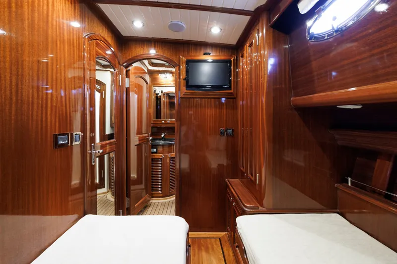 Slide: The Image of Luxurious 2010 Vicem 64 yacht interior with polished wood finish and modern amenities. - 87