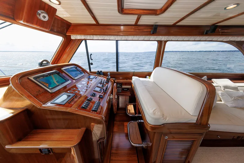 Slide: The Image of Luxurious 2010 Vicem 64 yacht interior with wooden helm and ocean view. - 61