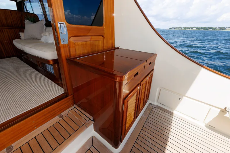 Slide: The Image of Luxurious interior of 2010 Vicem 64 yacht with polished wood finishes and ocean view. - 41