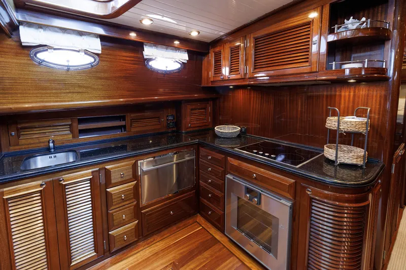 Slide: The Image of Luxurious wooden kitchen interior of 2010 Vicem 64 yacht with modern appliances. - 73