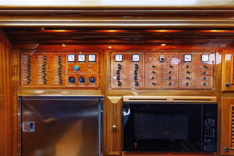 Slide: The Image of Control panel and microwave in 2010 Vicem 64 yacht interior. - 74