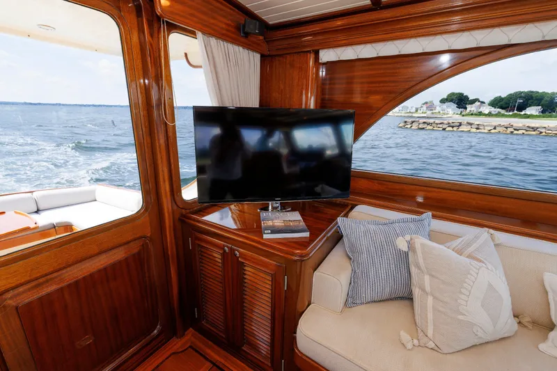 Slide: The Image of Luxurious interior of 2010 Vicem 64 yacht with TV, cushions, and ocean view. - 53