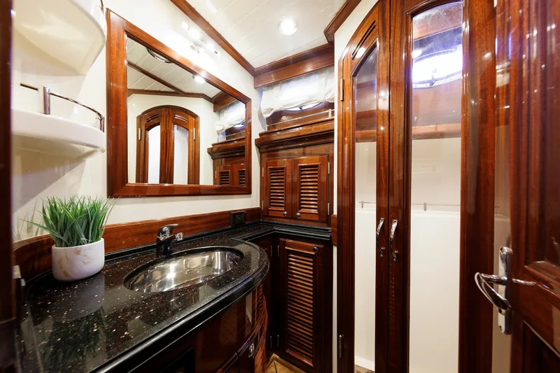Slide: The Image of Luxurious 2010 Vicem 64 yacht bathroom with elegant wood finishes and modern fixtures. - 82