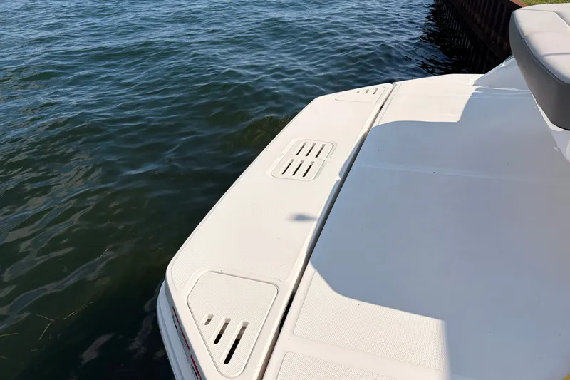 Slide: The Image of Rear deck of 2025 Sea Ray Sundancer 320 overlooking calm water. - 32