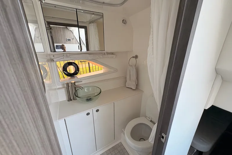 Slide: The Image of Bathroom interior of 2025 Sea Ray Sundancer 320 yacht with modern fixtures. - 31