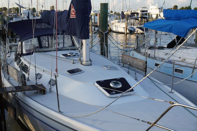 Slide: The Image of Catalina 36 MkII sailboat docked at marina, 2000 model, with blue covers. - 4