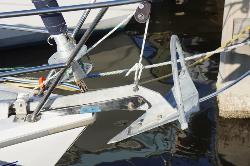 Slide: The Image of Anchor and bow of 2000 Catalina 36 MkII sailboat at dock. - 13