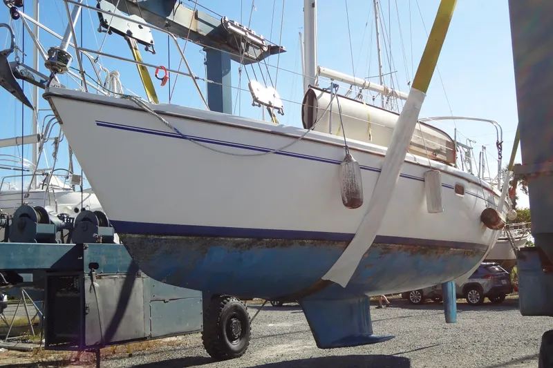 Slide: The Image of 2000 Catalina 36 MkII sailboat in dry dock, undergoing maintenance. - 18