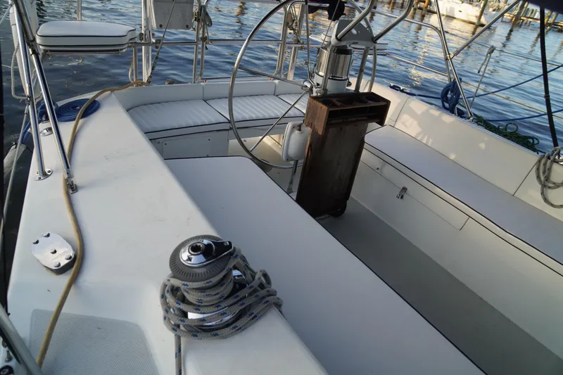Slide: The Image of Cockpit of a 2000 Catalina 36 MkII sailboat with steering wheel and seating. - 7