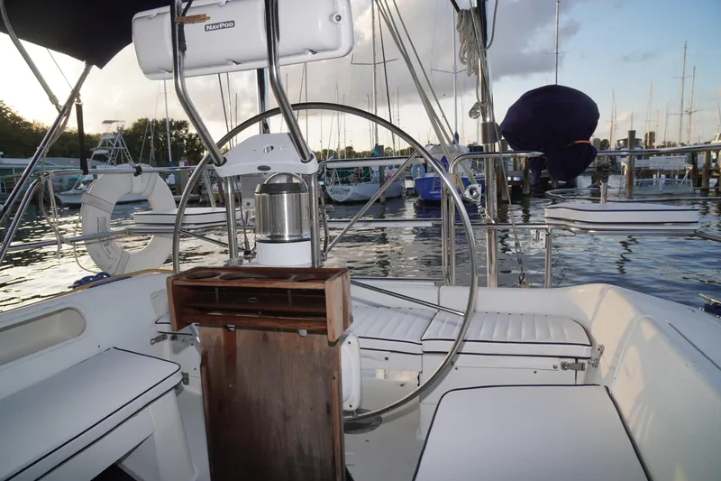 Slide: The Image of Cockpit of a 2000 Catalina 36 MkII sailboat docked at a marina. - 9