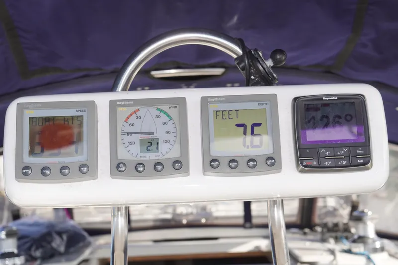 Slide: The Image of Control panel of a 2000 Catalina 36 MkII sailboat with navigation instruments. - 12