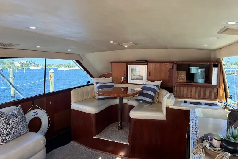 Slide: The Image of Luxurious interior of a 1997 Ocean Yachts 40 Super Sport with elegant seating and ocean view. - 44