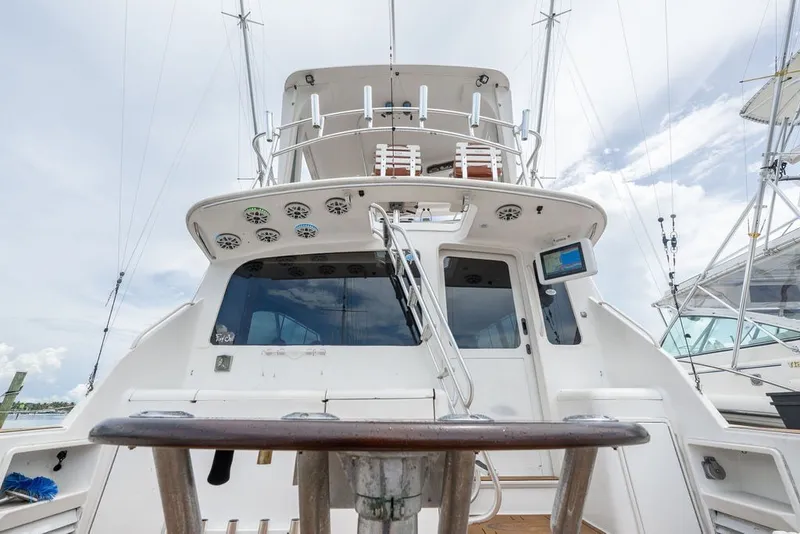 Slide: The Image of 1997 Ocean Yachts 40 Super Sport, rear view with fishing equipment and upper deck. - 22