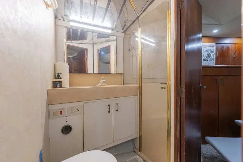 Slide: The Image of Bathroom interior of 1997 Ocean Yachts 40 Super Sport with shower and vanity. - 61