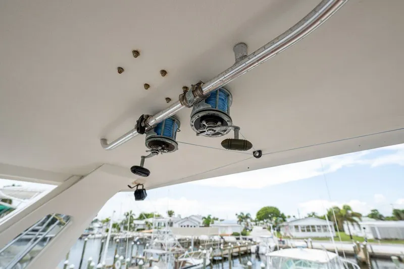 Slide: The Image of Fishing equipment on 1997 Ocean Yachts 40 Super Sport, docked at marina. - 25