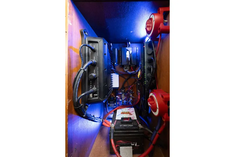 Slide: The Image of Electrical system inside a 1997 Ocean Yachts 40 Super Sport, featuring wiring and components. - 68