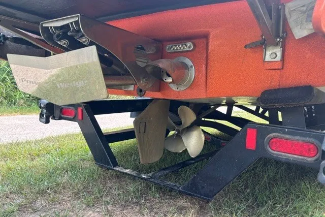 Slide: The Image of 2013 Malibu Wakesetter 23 LSV boat trailer with propeller and rudder detail. - 4