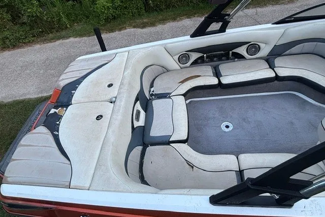 Slide: The Image of 2013 Malibu Wakesetter 23 LSV interior with spacious seating and audio system. - 7