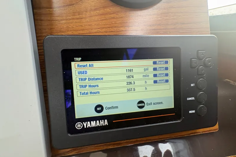 Slide: The Image of Yamaha display on 2018 Ranger Tugs R-27 showing trip data and fuel usage. - 28