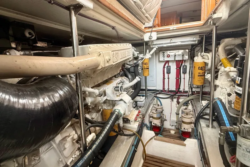 Slide: The Image of Engine room of 2001 Grand Banks 49 Eastbay HX with CAT machinery and components. - 30