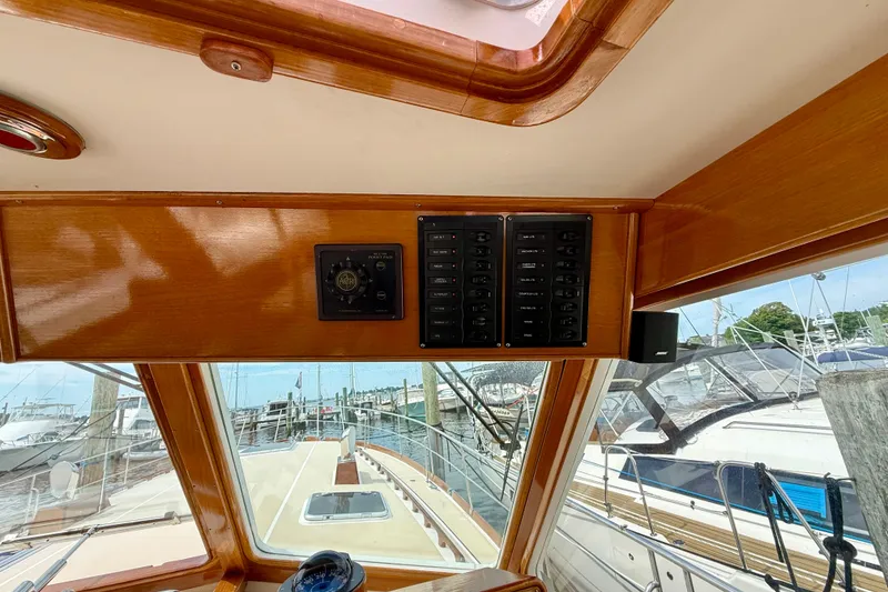 Slide: The Image of Interior view of 2001 Grand Banks 49 Eastbay HX yacht with control panel. - 62