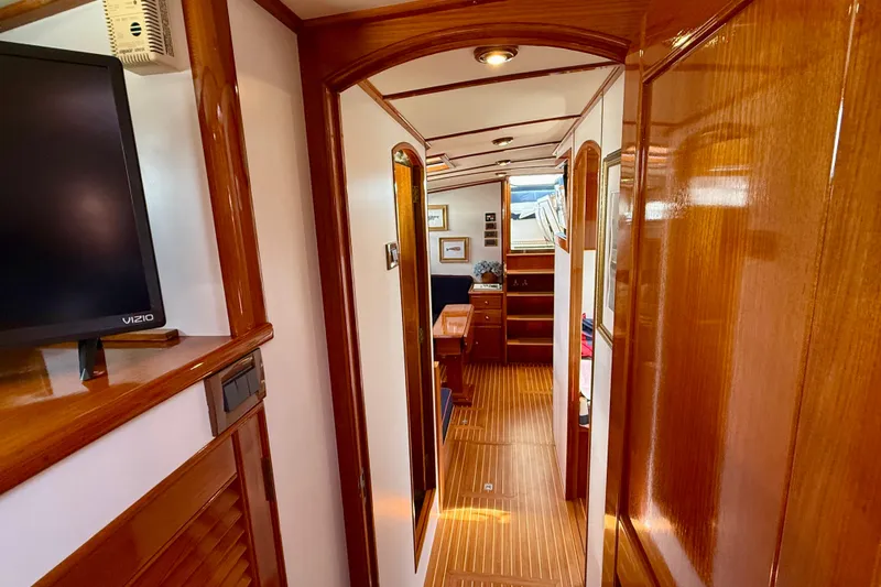 Slide: The Image of Interior of 2001 Grand Banks 49 Eastbay HX yacht with polished wood finish. - 42