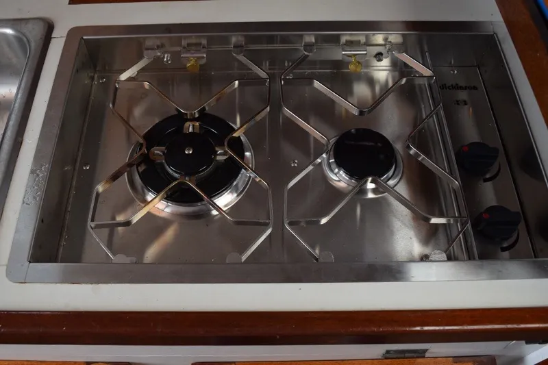 Slide: The Image of Stainless steel two-burner stove on a 1974 Wasque 32 boat. - 24