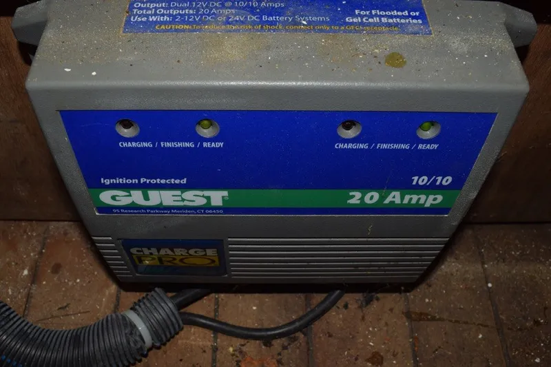 Slide: The Image of Guest 20 Amp battery charger on 1974 Wasque 32 boat, showing charging status indicators. - 38