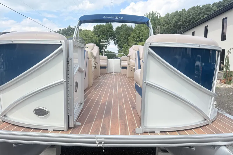 Slide: The Image of 2017 South Bay 500 pontoon boat with spacious deck and comfortable seating. - 2