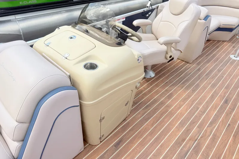 Slide: The Image of Luxurious interior of a 2017 South Bay 500 boat with plush seating and wood flooring. - 9