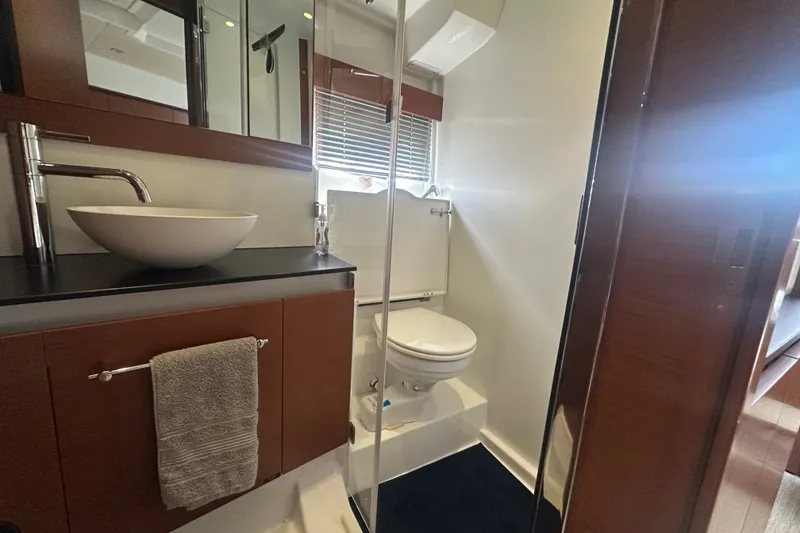 Slide: The Image of Luxurious bathroom in 2015 Jeanneau Leader 40 yacht with modern fixtures and elegant design. - 31