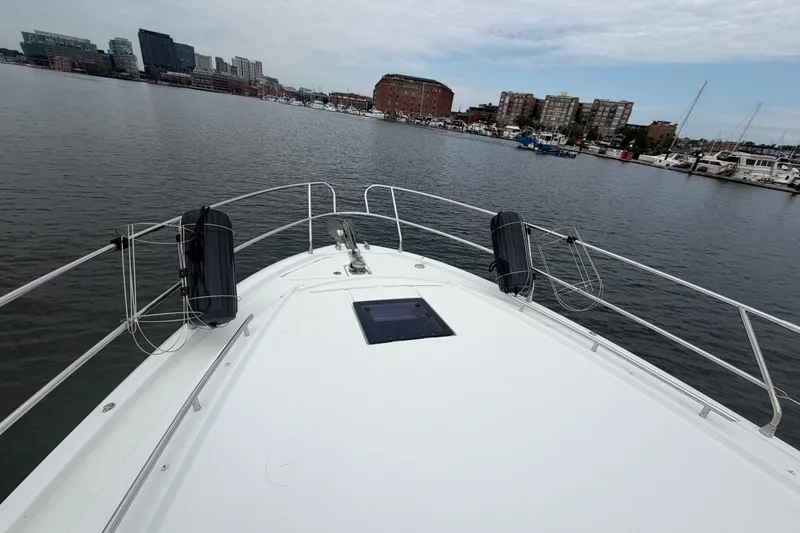 Slide: The Image of Bow view of 2015 Jeanneau Leader 40 yacht in a marina setting. - 14