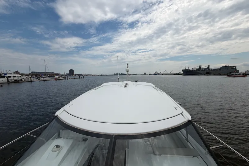Slide: The Image of Front view of 2015 Jeanneau Leader 40 yacht on calm waters under cloudy sky. - 17