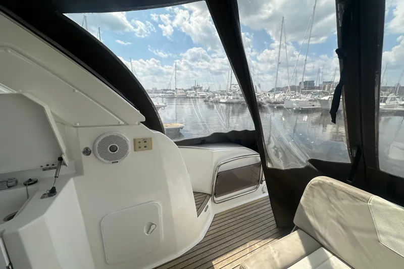 Slide: The Image of Interior view of 2015 Jeanneau Leader 40 yacht with marina backdrop. - 43