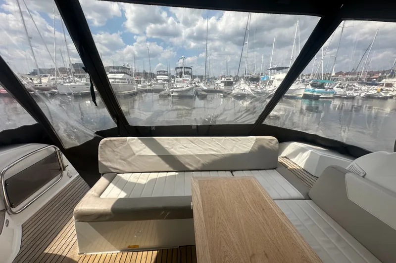 Slide: The Image of Interior view of 2015 Jeanneau Leader 40 yacht with marina backdrop. - 21