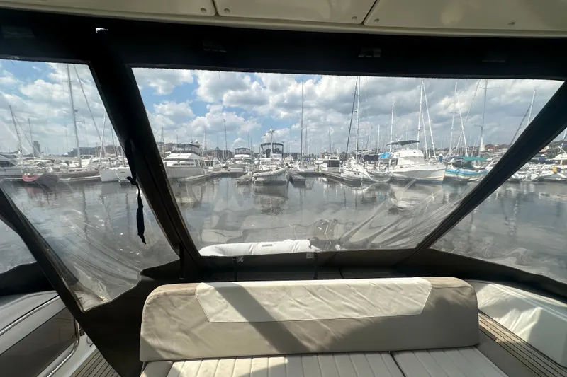Slide: The Image of View from Jeanneau Leader 40 yacht, 2015 model, overlooking a marina with sailboats. - 22