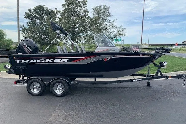 The Image of 2019 Tracker Targa 18 boat on trailer, parked outdoors. - 0