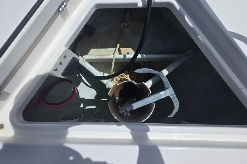 Slide: The Image of Anchor storage compartment on a 2019 Contender 30 ST boat. - 65