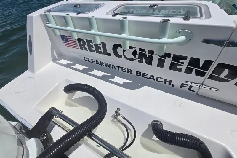 Slide: The Image of 2019 Contender 30 ST boat with "Reel Contender" text, Clearwater Beach, FL. - 81