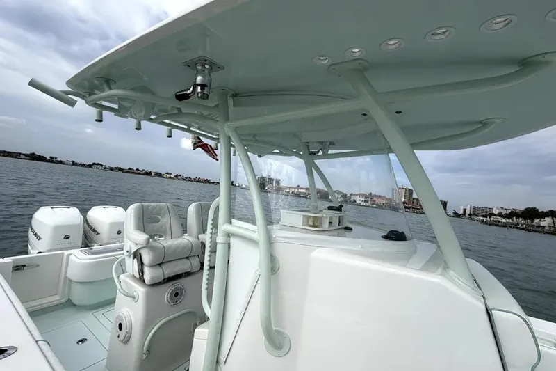 Slide: The Image of 2019 Contender 30 ST boat interior with seating and ocean view. - 15