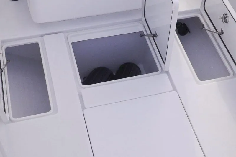 Slide: The Image of Manufacturer Provided Image: 2019 Contender 30 ST boat storage compartments with open hatches. - 5