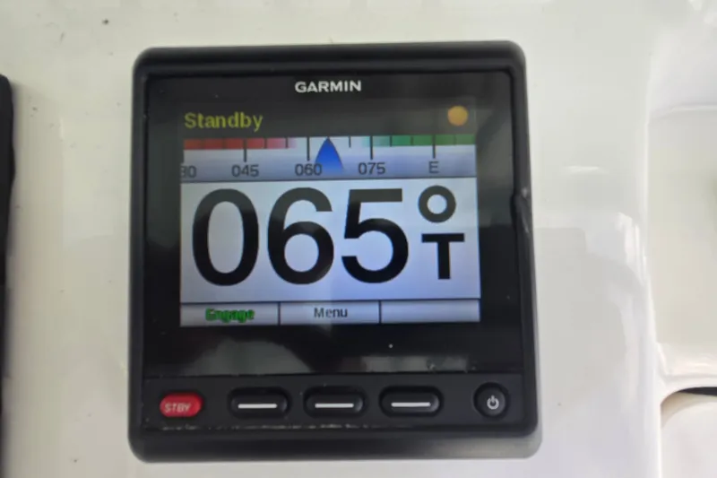 Slide: The Image of Garmin marine display showing 065 degrees on a 2019 Contender 30 ST boat. - 46