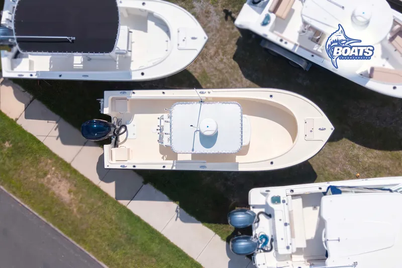 Slide: The Image of Overhead view of a 2013 Parker 2300 Special Edition boat in a display area. - 11