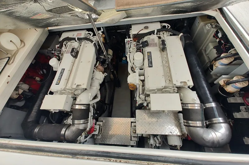 Slide: The Image of Engine room of 2000 Sea Ray Sundancer 400 with dual Caterpillar engines. - 28