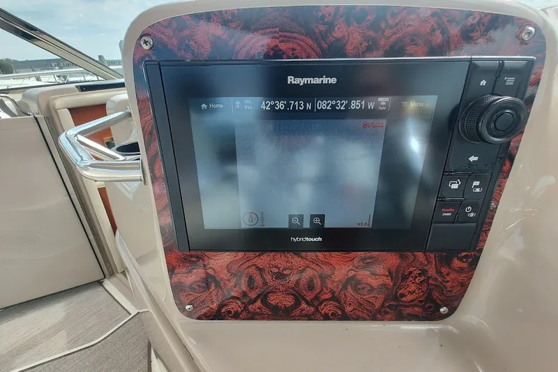 Slide: The Image of Raymarine navigation display on 2000 Sea Ray Sundancer 400 yacht dashboard. - 18