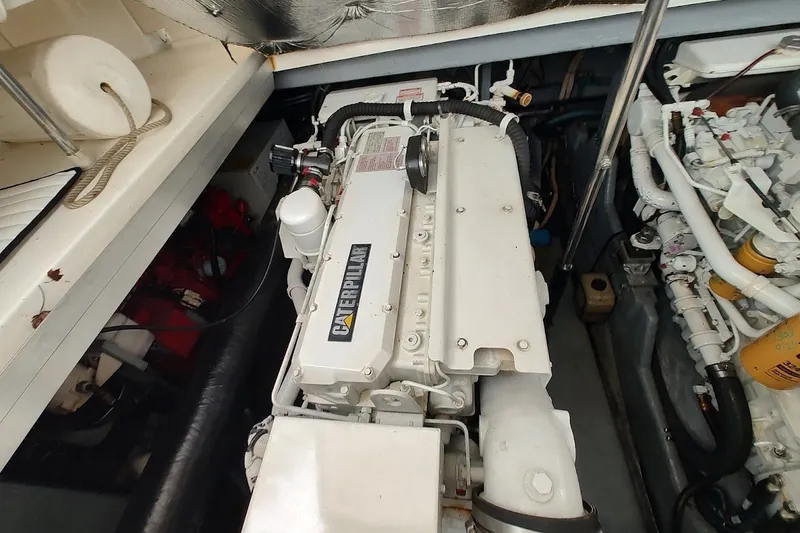 Slide: The Image of Engine compartment of a 2000 Sea Ray Sundancer 400 with Caterpillar engine. - 37